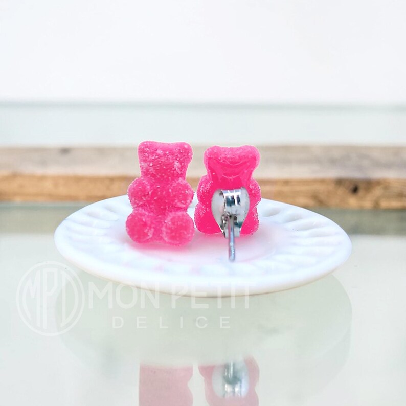 Back view of handmade red pink sugar gummy bears stud earrings with stainless steel