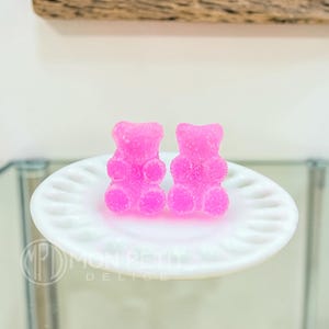 Pink sugar gummy bear stud earrings handmade in resin, close-up view