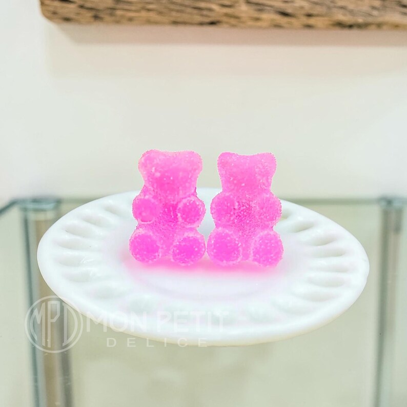 Pink sugar gummy bear stud earrings handmade in resin, close-up view