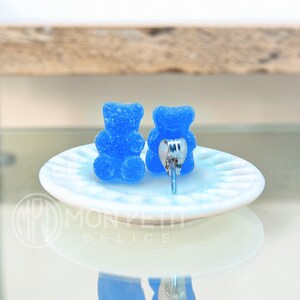 Back view of handmade blue sugar gummy bears stud earrings with stainless steel