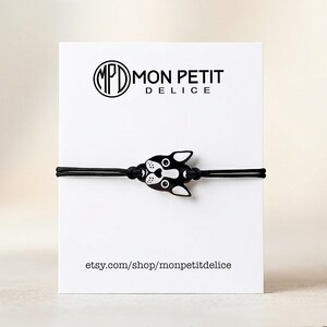 Boston Terrier bracelet displayed on a white Mon Petit Delice backing card. Ready to gift packaging for dog birthdays or pet memorial gifts.