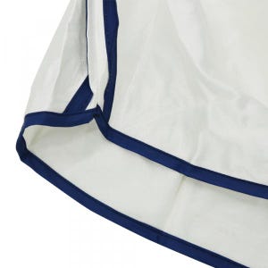May include: White fabric with a navy blue trim around the edges. The fabric is folded over itself, creating a double layer.