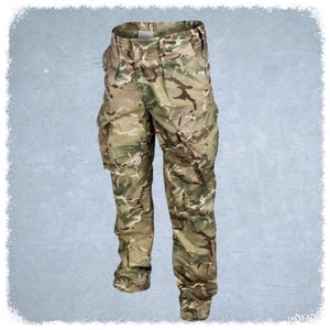 May include: Camouflage cargo trousers with multiple pockets. The trousers are a blend of green, brown, and tan.