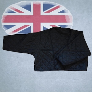 May include: A set of three ceramic nesting bowls in shades of blue, green, and white. The bowls feature a speckled design and varying sizes, perfect for food preparation or serving.