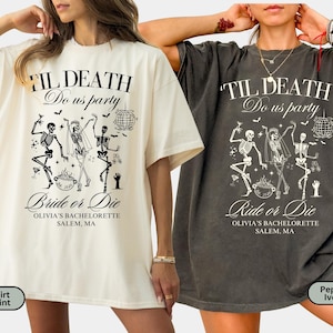 May include: Ivory and pepper-colored t-shirts with a black graphic print. The design features skeletons dancing with the text "'Til Death Do Us Party" and "Bride or Die" or "Ride or Die". The shirts are for Olivia's Bachelorette in Salem, MA.