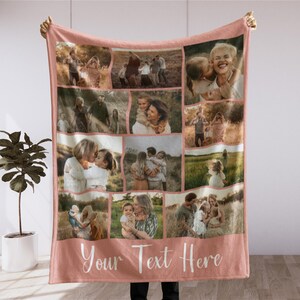 May include: A personalized pink fleece blanket featuring a collage of family photos. The blanket has a light pink border and includes the text "Your Text Here" in a cursive font. The photos depict various family moments.