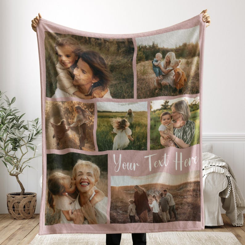 May include: A personalized pink fleece blanket featuring a collage of family photos. The blanket has a light pink border and includes the text "Your Text Here" in a cursive font. The photos depict various family members.