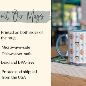 May include: A white ceramic mug with a blue handle and interior. The mug features a pattern of baby faces and blue hearts on a light blue striped background. The text "About Our Mugs" is visible.
