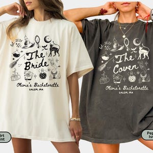 May include: Two oversized t-shirts, one ivory and one pepper, feature a black graphic design. The design includes the text "The Bride" and "The Coven", along with witch-themed illustrations. The text "Olivia's Bachelorette, Salem, MA" is also present.
