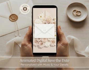 May include: A smartphone displays an animated digital save the date invitation with floral elements. The phone is held in two hands. The invitation features a white envelope with the initials "AT". The image includes a plate with rings and an envelope.