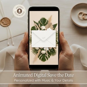 Könnte beinhalten: Ein Smartphone zeigt eine digitale Hochzeitseinladung mit einem Blumenarrangement und einer Umschlaggrafik. Das Bild enthält einen weißen Umschlag, einen Teller mit Ringen und den Text "Animated Digital Save the Date".