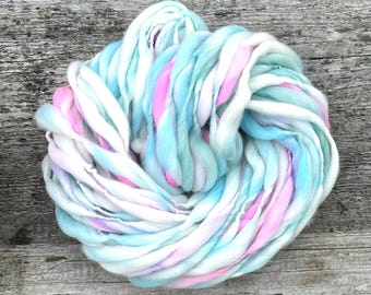 50 yards cream and pastel super bulky yarn, handspun thick and thin in merino wool, 3 to 3.1 ounces (86 to 89 grams)