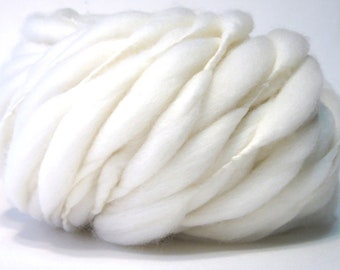 100 yards, 6.75 oz/191 grams super bulky handspun yarn, spun thick and thin in natural cream merino wool