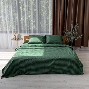 Flat and fitted green cotton sheet set