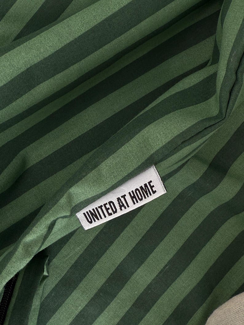 Minimalist green bedding sheet with stripes