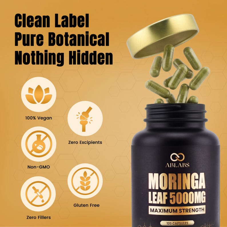 May include: A black bottle of Moringa Leaf 5000MG capsules with a gold lid. The label includes the text "Maximum Strength" and "120 Capsules". The image also features text stating "Clean Label, Pure Botanical, Nothing Hidden".