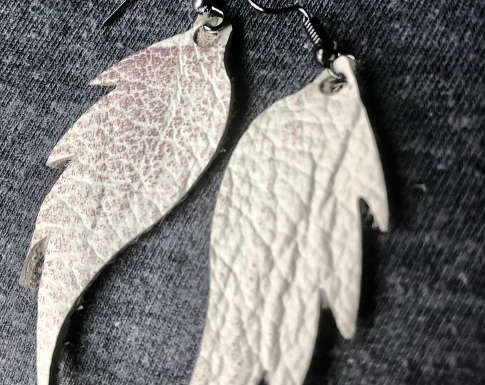 Antiqued white leather wing earrings