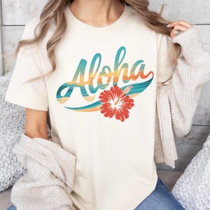 T-shirt Aloha, chemise Aloha, t-shirt Hawaï, t-shirts femme, t-shirt surdimensionné, t-shirt de plage, t-shirt d'été, chemise à fleurs d'hibiscus