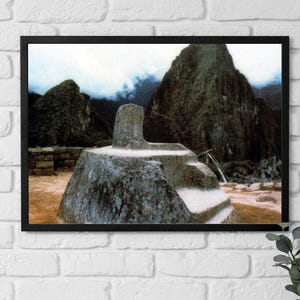 May include: A stone throne-like structure with steps leading up to it. The throne is situated in front of a large, rocky mountain. The scene evokes an ancient civilisation.