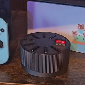 Archivo STL para impresión 3D: estante de almacenamiento giratorio para juegos de Nintendo Switch