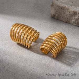 Pendiente de oreja grueso en espiral dorada sin perforación, pendiente de oreja envolvente de acero inoxidable para un look de oreja llamativo.