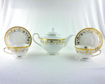 Teavanna Exclusive Collection Hand Finished Bone China 100 in Gold and White Great for Entertaining Fancy Teapots, cups and saucers for two