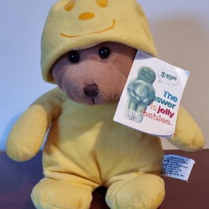 JDRF &quot;Jelly Baby&quot; Bear Plush - 25cm Yellow Smiley Face Teddy Bear | Diabetes Awareness Charity Toy