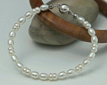 Thea - Beautiful white Freshwater Pearl bracelet with Sterling Silver magnetic clasp. Free Shipping within the US.