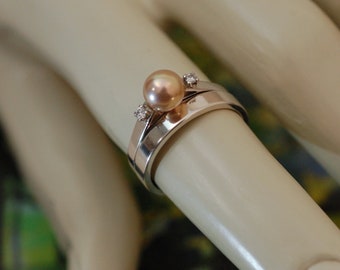 Bente - Diamond-accented Pearl stacking or engagement ring features a uniquely natural color Freshwater Pearl set in solid 14kt white gold.