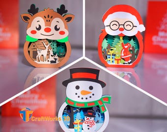 Plantilla de tarjeta navideña desplegable 3D: Papá Noel, muñeco de nieve y reno (archivos PDF SVG Studio)