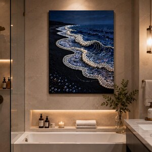 May include: A rectangular wall art piece depicting a dark ocean scene at night where the crashing waves are composed of numerous white pearls. The deep blue and black water contrasts with the luminous, spherical white pearls along the shoreline.