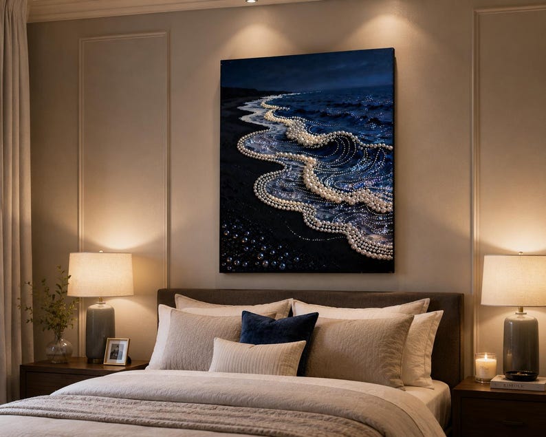 May include: A rectangular wall art print featuring a dark, moody ocean scene at night. The crashing waves are depicted as strings of white pearls flowing onto a dark sandy beach, creating a surreal contrast between the deep blue sea and gems.