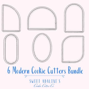 Puede incluir: Un conjunto de seis cortadores de galletas modernos en varias formas, incluyendo arcos, óvalos y rectángulos redondeados. Los cortadores están hechos de metal y están diseñados para usar con masa para galletas. El texto "6 Modern Cookie Cutters Bundle" se muestra debajo de los cortadores.