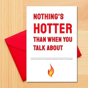 May include: A white card with red text that reads "NOTHING'S HOTTER THAN WHEN YOU TALK ABOUT" with a blank space to write in the subject of the obsession.  The card has a small red flame graphic at the bottom.