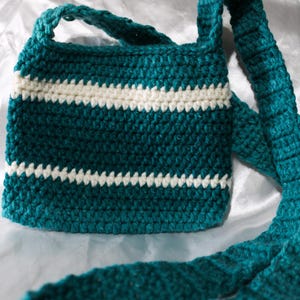 Lange Schultertasche