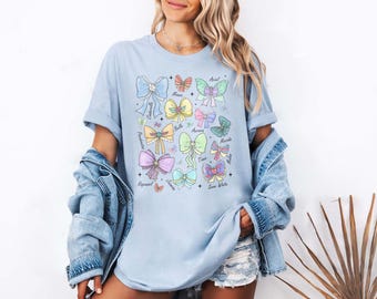 Camiseta de princesas Disney con acuarela y lazos de Coquette, camiseta de Disney Aurora, Ariel, Bella, Cenicienta, Tiana, viaje de chicas a Magic Kingdom Disneyland 2025