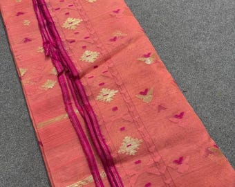 Authentic Dhakai Jamdani saree in peach color with golden zaari work , 84 counts. Comes with a blouse piece