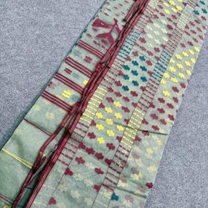 Authentic Dhakai Jamdani saree in multicolor, 84 counts. Comes with a blouse piece