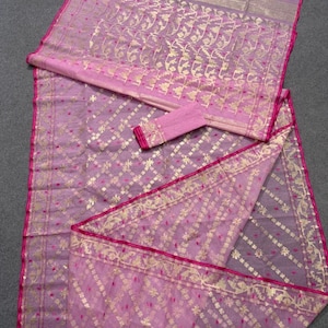 Exclusive handloomed Dhakai Jamdani saree in pink with golden zari work, 100 counts. Comes with a blouse piece