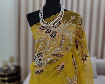 Authentic Muslin saree with embroidery and zardosi work for party ware