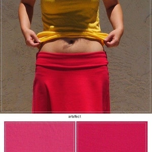 May include: A bright yellow sleeveless tank top paired with a solid red skirt featuring a wide, folded waistband. Below the garment, two fabric swatches are displayed side-by-side, labeled Pink and Deep Fuchsia, showcasing color options.