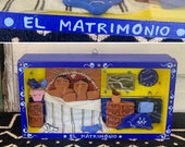 Sweet Vintage Shadow Box EL MATRIMONIO Diorama Mexico Folk Art Featuring Couple in Bed, Cat, Champagne on Ice, measuring 10 quot x 5.5 quot x 2 quot