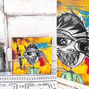 Vintage Outsider Art Mixed Media Paper, Ink, and Paint on Wood Wall Hanging measuring 11.25&quot; x 10 5/8&quot; ~ Pop Art ~