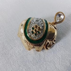 Vintage jewelry A&S Attwood and Sawyer elephant sadle diadem brooch goldtoned Swarovski rhinestone signed