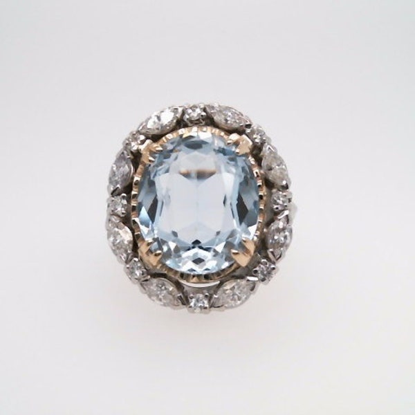 Vintage Platinum & 14 Karat Yellow Gold Oval Light Blue Synthetic Spinel Ring with Marquise and Round Brilliant Diamond Halo Estate Jewelry