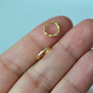 Minimalist Tragus Hoop Piercing – Rhodium-Plated,Sold as a set of 2 in gold or silver color Durable & Stylish!Minimal Hoop Piercing 2 Pieces