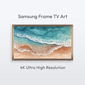 May include: A rectangular artwork with a gold frame depicts a beach scene. The image shows turquoise waves crashing onto a sandy shore. The text "Samsung Frame TV Art" and "4K Ultra High Resolution" are displayed.