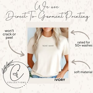 May include: Ivory t-shirt with the text "bird nerd" printed on the front. The shirt is made with a soft material and is rated for 50+ washes. Direct-to-garment printing is used for a high-quality, long-lasting design.