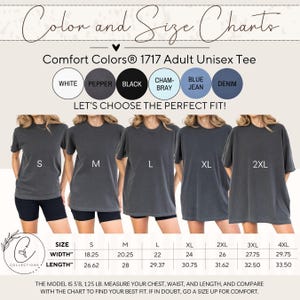 May include: A Comfort Colors 1717 adult unisex tee size and color chart. The image displays six color circles labeled white, pepper, black, chambray, blue jean, and denim. Five t-shirts in sizes S, M, L, XL, and 2XL are shown with a sizing table.