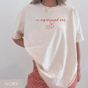 Future Mrs Engagement Shirt: Custom In My Engaged Era Coquette Locket Comfort Colors Personalized Bride To Be Shirt